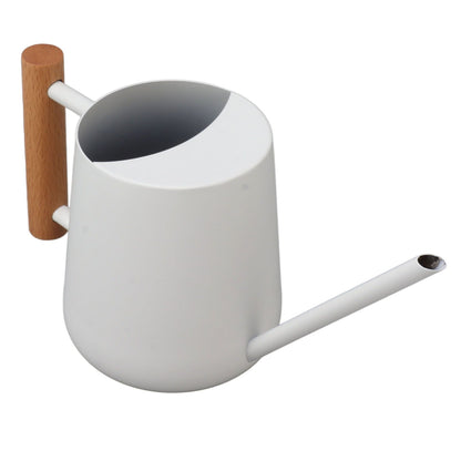 White watering can with long spout and wooden handle, angled view