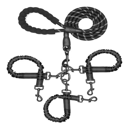Black three in one tangle free dog lead with padded handle and bungee couplers on a white background