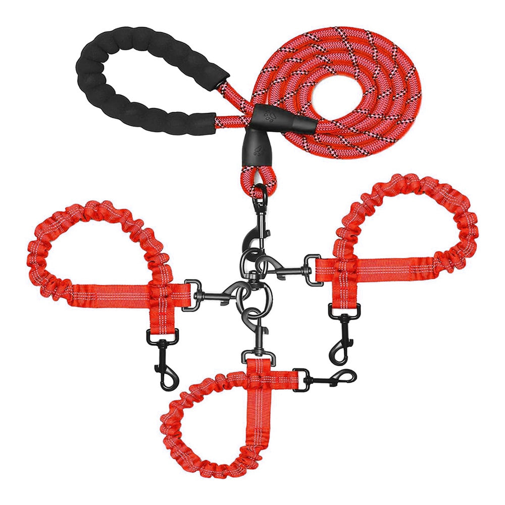 Red three-way dog lead, padded handle, bungee couplers and three clips, laid flat